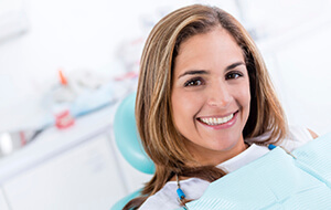 Smiling woman in dental chair