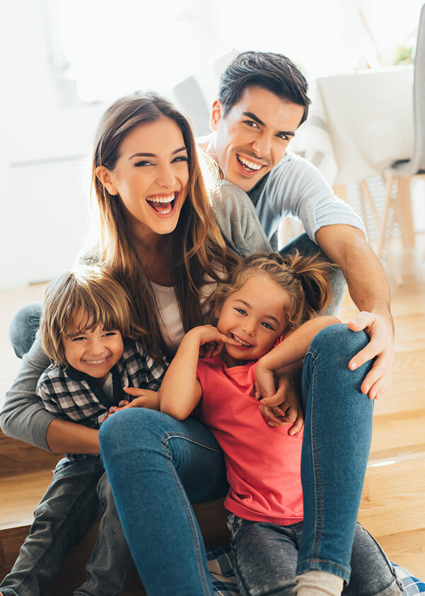 Laughing family of four