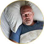 Man in bed sleeping